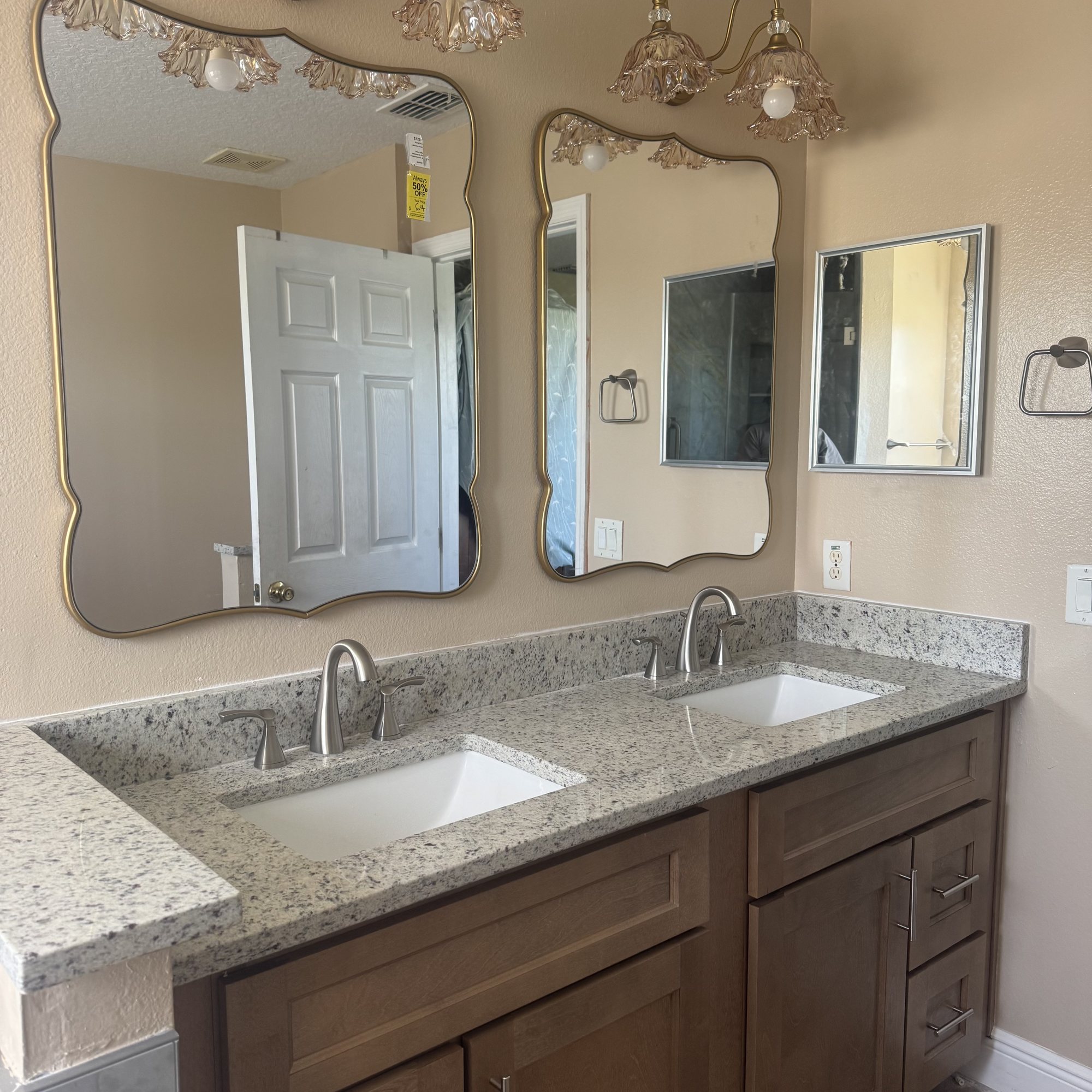 Bathroom vanity with granite top installed by Xclusive Floors & More in Kissimmee, FL